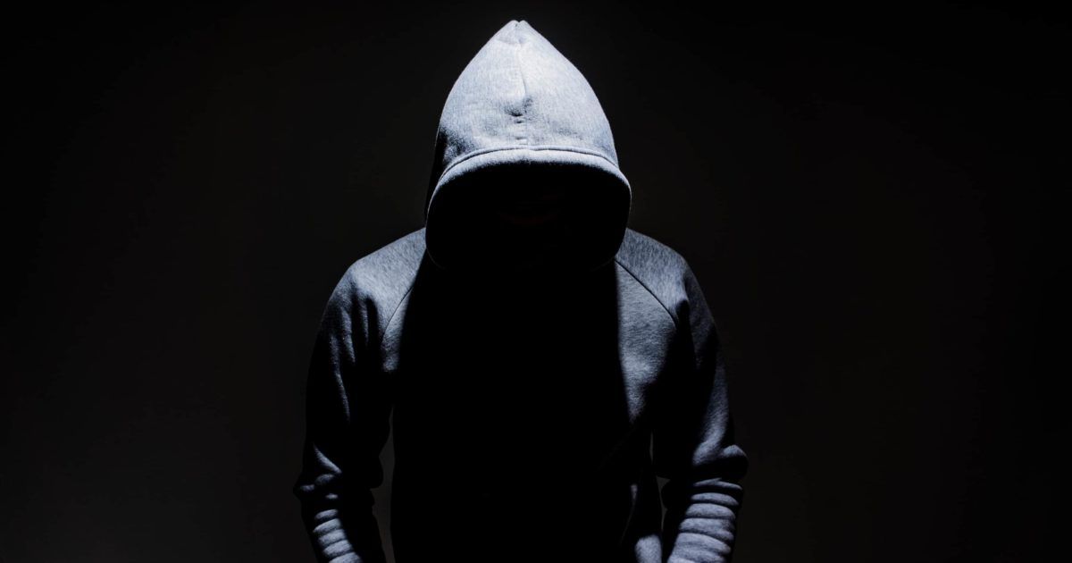 Silhouette Man In Hoodie Sweatshirt Dark Alley 1200x630 Cropped